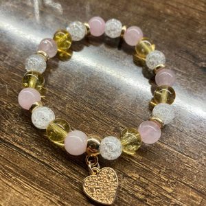 Cirin aranyszínű szív medállal