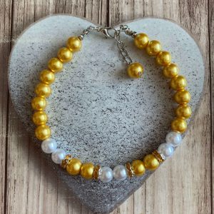 Arany-fehér színű bokalánc